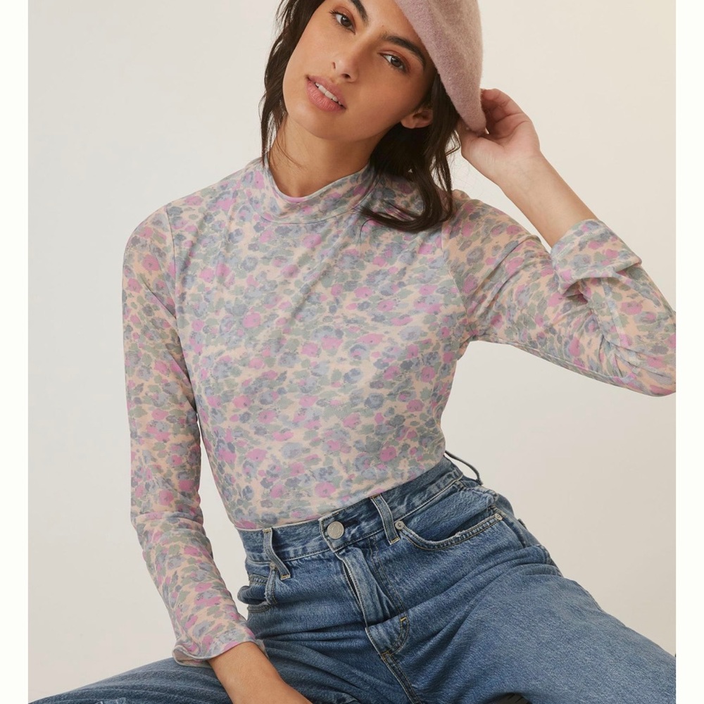 Anthropologie sheer gauzy turtleneck top.